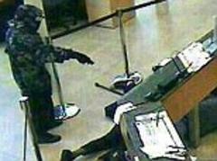 The executioner: Caught on CCTV, the horrific moment Al Shabaab gunman took deadly aim at hostages in Nairobi mall massacre
